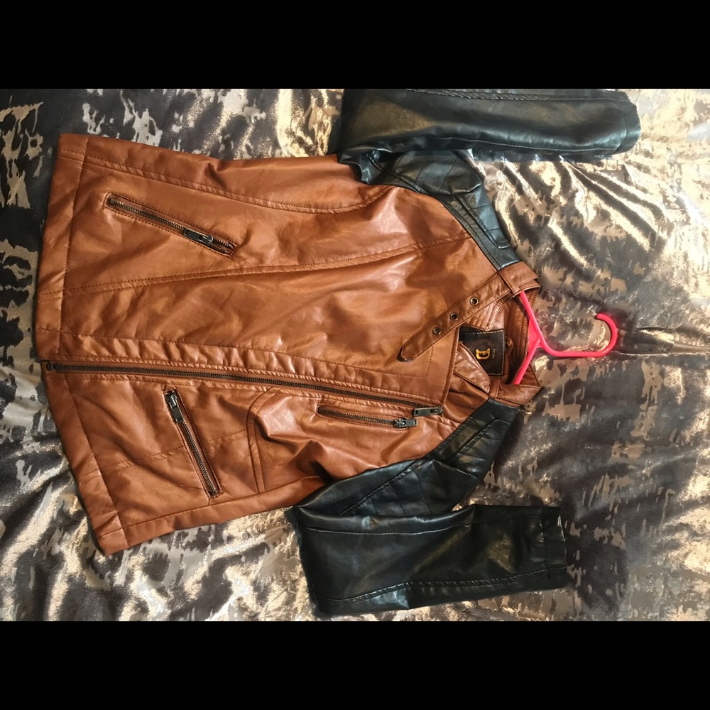 Size small doll face leather jacket brand new